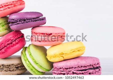 Similar – Image, Stock Photo Colored macaroons on rustic wooden background