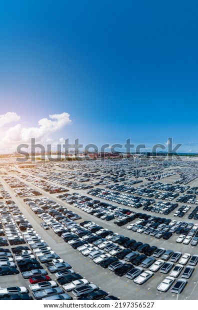 Many new cars parking before shipping to Dealer\
Customer, Cars shipping to Ro-Ro Ship for import export Freight\
forwarding , Logistics transportation dealer shipping Cars Export\
Terminal at Yokohama