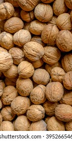 many nuts in the shell. Texture, background