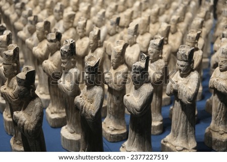 many old ancient Chinese figurines in Ming Dynasty. Cultural relic in China