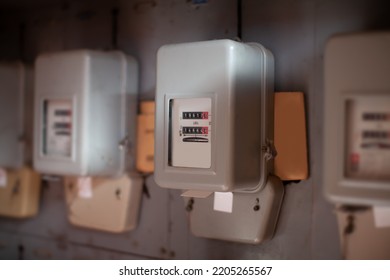 many old electricity consumption meters - Shutterstock ID 2205265567