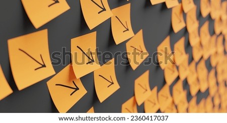 Many orange stickers on black board background with decrease symbol drawn on them. Closeup view with narrow depth of field and selective focus