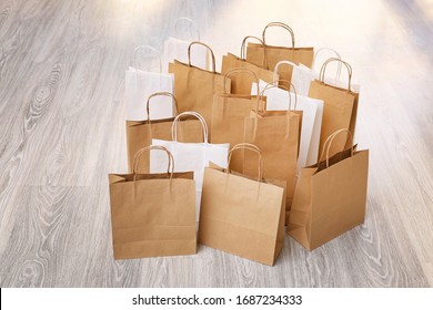 Many Paper Shopping Bags On Floor