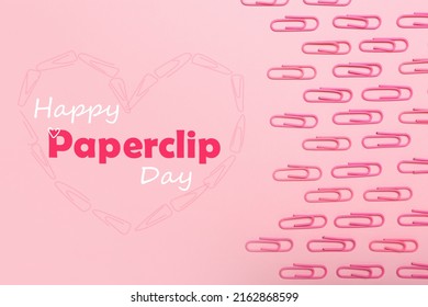 Many paperclips on pink background. Greeting card for National Paperclip Day