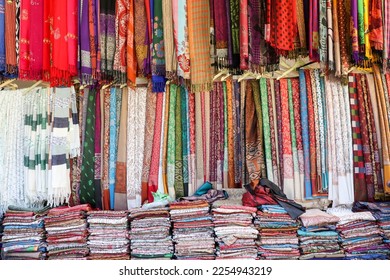 Many Pashtush Women Kashmiri Shawl for sale in Mall road Manali Shimla Kashmir Himachal Pradesh India. Jacquard palla Warm and soft Faux Pashmina Design