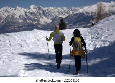 Many People Cross A Snowy Winter Day