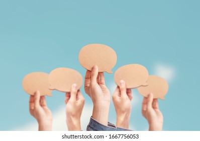 Many people showing a Blank Speech Bubble, process of discussion and commenting, Best thought, good idea, positive feedback. Opinion of the public and surrounding people - Shutterstock ID 1667756053