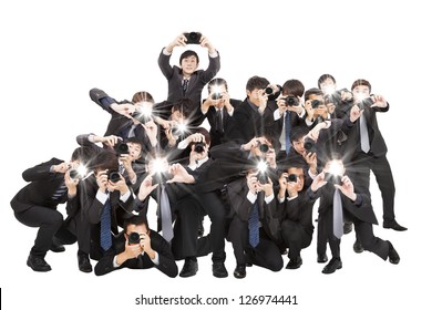 many photographers holding camera pointing to you and isolated on white - Shutterstock ID 126974441