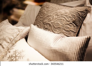 Many Pillows On The Bed