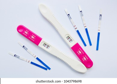 Many positive pregnancy tests. Fertility, pregnancy and maternity concept