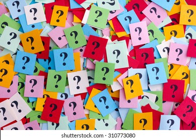 Too Many Questions. Pile of colorful paper notes with question marks. Closeup. - Shutterstock ID 310773080