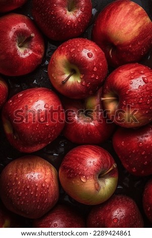 many red ripe apples close-up with water drops