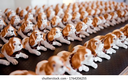 Many Rows Of Bobble Head Dog On Dark Table Prestns 