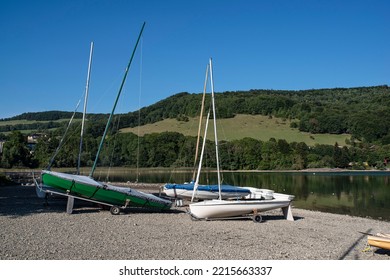 Many Sailboats Lined Up On The Beach