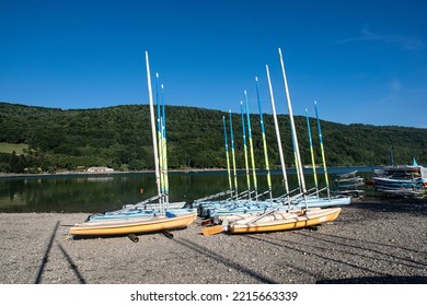 Many Sailboats Lined Up On The Beach