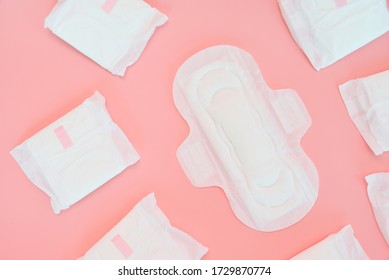 Many sanitary napkin on pink background - Shutterstock ID 1729870774