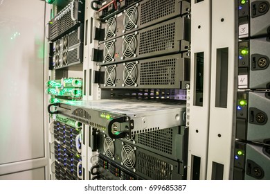 Many servers are installed in the rack. Computer equipment close-up. The technical site of a large data center.