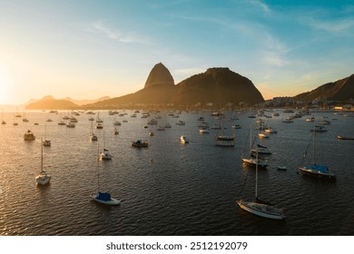 Many Small Boats in Botafogo Bay With Sugarloaf Mountain in the Horizon on Sunrise in Rio de Janeiro, Brazil - Powered by Shutterstock