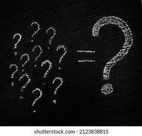 Many small question marks and one large question mark are drawn in white chalk on a rough black background. The concept of thinking or solving a given problem in a corporate environment