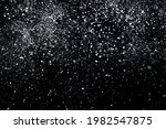 Many snowflakes in blur on black background. Snowfall layer for winter photography.