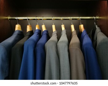 Many Suit Hang In The Closet