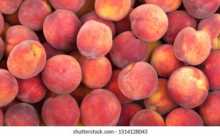 Many sweet peach fruits background