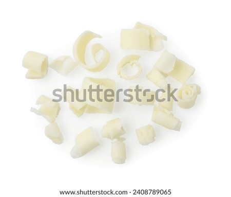 Many tasty chocolate shavings isolated on white, top view