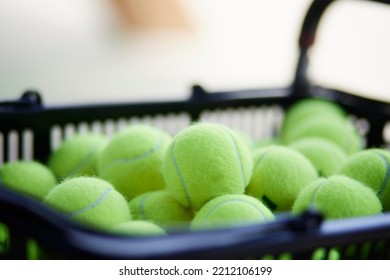 Many Tennis Balls In A Basket