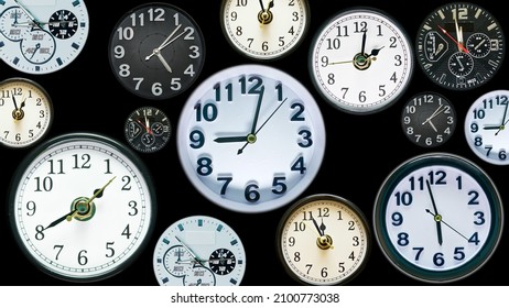 Many time clock faces appear showing different  time. Various clocks in busy time flow concept. 