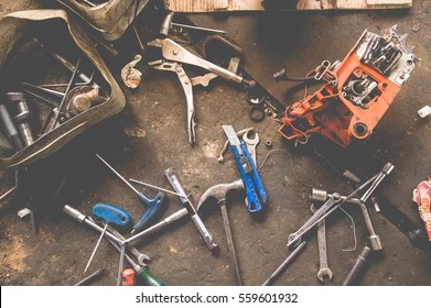 Many Tools On Dirty Floor, Set Craftsman Tool , Mechanical Tools. Professional  Mechanic Using Different Tools For Working In Auto Repair Service.