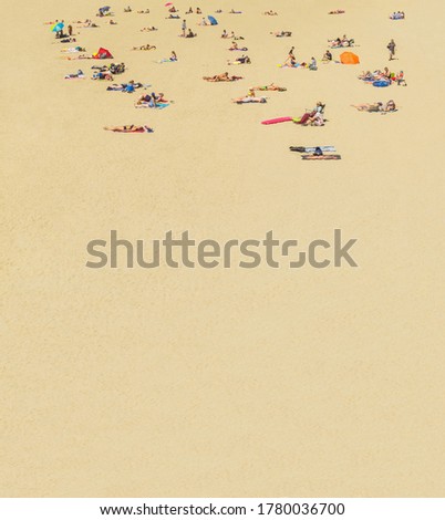 Similar – Aerial View From Flying Drone Of People Crowd Relaxing On Algarve Beach In Portugal