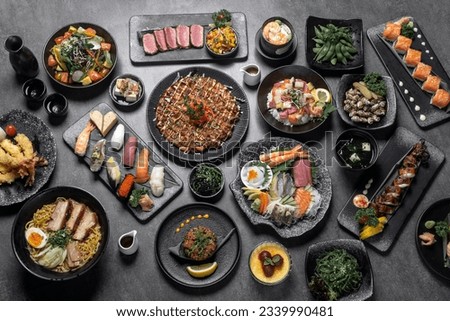 many traditional gourmet japanese food dishes variety on grey background