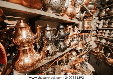 many traditional turkish copper teapot in a handicraft shop