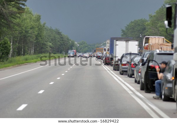 Many trucks stopped on\
European road
