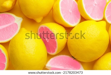 Many unusual pink lemon as background