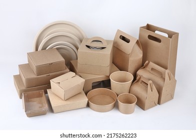 Many various take-out food containers on a white background