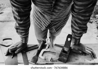 Many vintage carpenter tools such as Square ruler Clamp catch hammer chisel  saw pencil use decorate making furniture construction is a retro tool. - Powered by Shutterstock