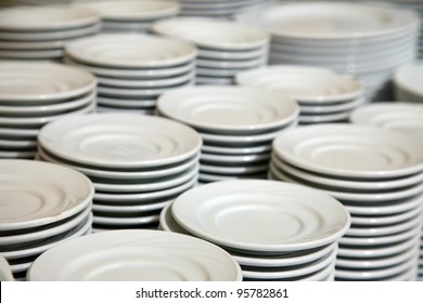 Many  White Different Plates Stacked Together