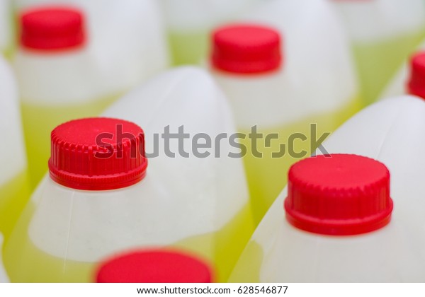 Download Many White Matte Bottles Yellow Liquid Stock Photo Edit Now 628546877 PSD Mockup Templates