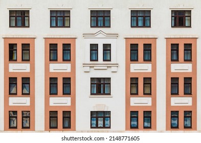 Many windows in a row on the facade of the modern urban apartment building front view, Krasnaya Polyana, Sochi, Krasnodar Krai, Russia