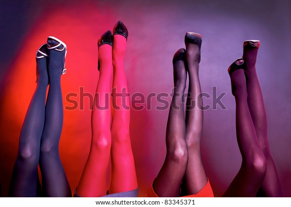 Many women's stockinged
legs raise up