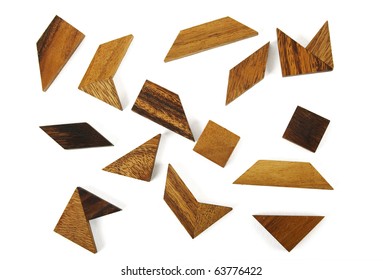many wooden geometrical figures puzzle isolated
