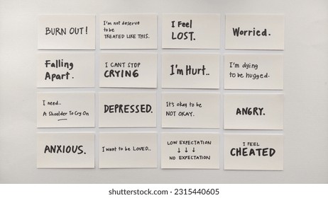 Many words related to 'depression', written on a white blank cards. White isolated background. - Shutterstock ID 2315440605