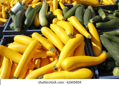 Many Yellow And Green Squash For Sale At An Outside Farm Fresh Market.