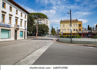 Manzano, Italy - 25.03.2020: Little Italian City During An Epidemic. Deserted Streets. Closed Bank And Shops. No People. No Cars. No One. Manzano, Friuli-Venezia Giulia. Italy