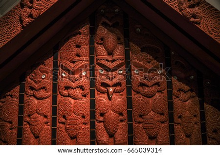 Maori wooden symbols in Auckland