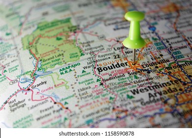 A Map Of Boulder, Colorado Marked With A Push Pin.