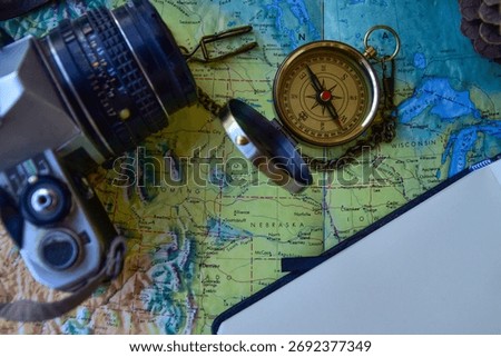 Map, compass and camera equipment for exploration