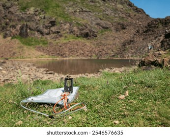 Map and Compass in Mountain Wilderness - Powered by Shutterstock