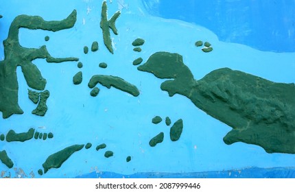 Map of the eastern Indonesian archipelago on the wall. Map painted on the wall, Sulawesi, Papua, Timor, Maluku 
